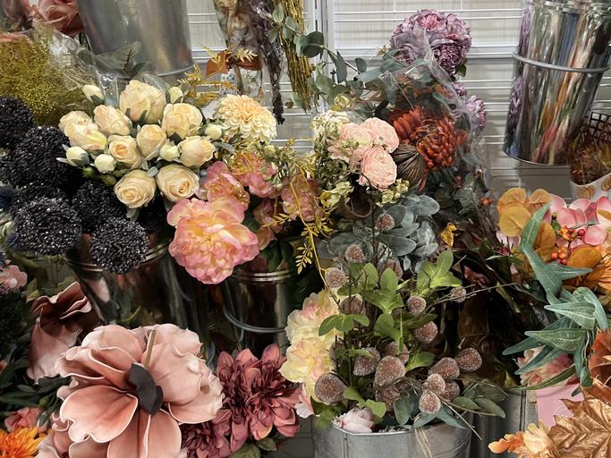 Styling artificial flower stems to create a natural arrangement