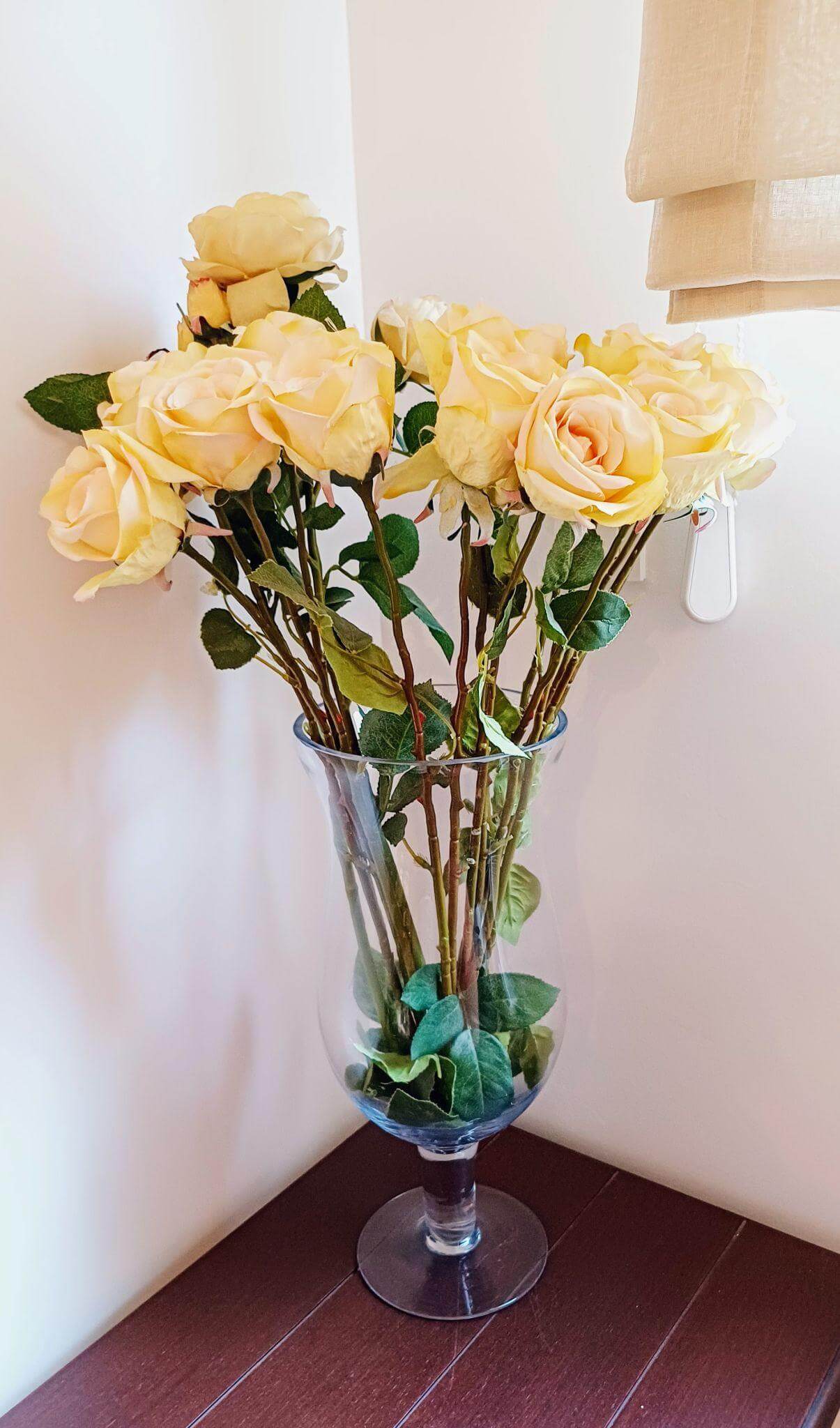 Artificial flower arrangement for beginners in a modern glass vase