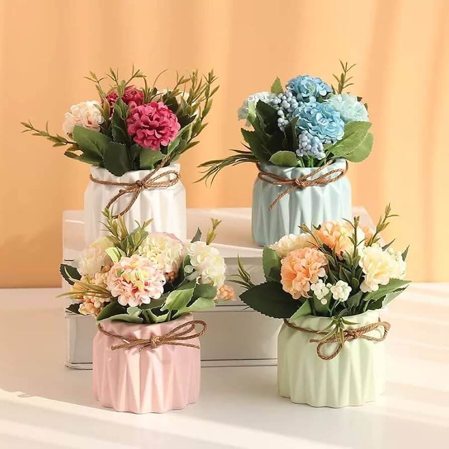 Medium artificial floral centerpiece with layered stem heights